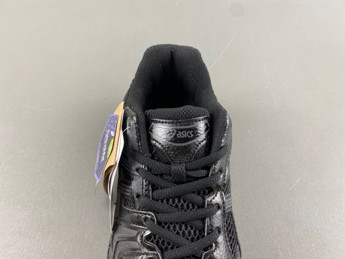As*ic*s sneaker