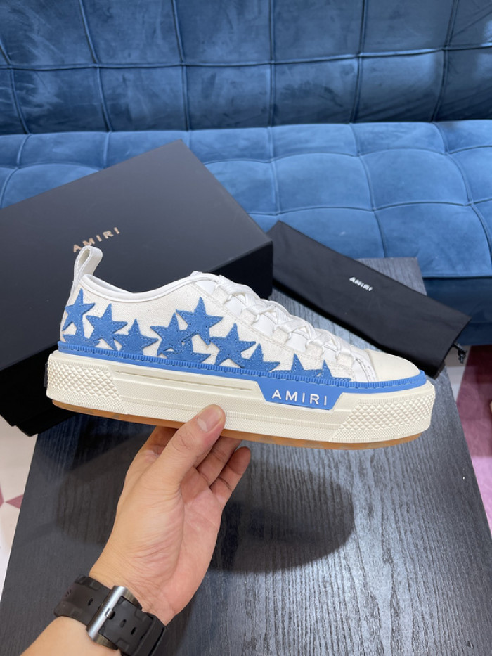 amiri* appliquéd leather and canvas sneakers