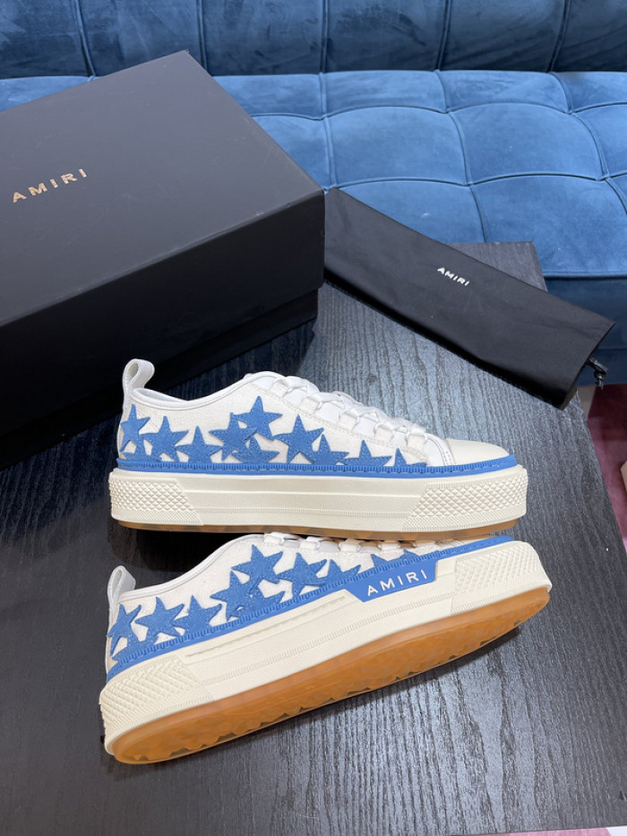 amiri* appliquéd leather and canvas sneakers